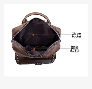 Detail of the vintage brown backpack interior with zipper pockets and inner lining