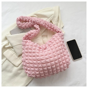 Pink popcorn texture ruched shoulder bag detail with wide strap and soft cloud shape