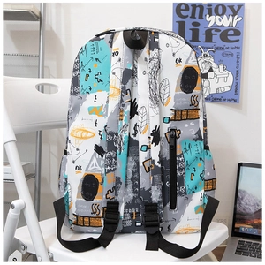 Detail view of the graffiti-style canvas backpack with security back pocket and straps