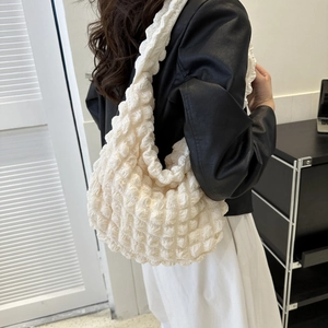 White bubble texture cloud bag for women featuring a minimalist pleated shoulder design