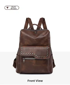Front view of dark brown soft leather backpack with circular metal rivet trim and zipper