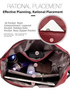 Macro detail of red leather bag showing organized compartments and large interior capacity