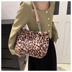 Close-up of pink leopard faux fur tote bag featuring silver chain and PU shoulder straps