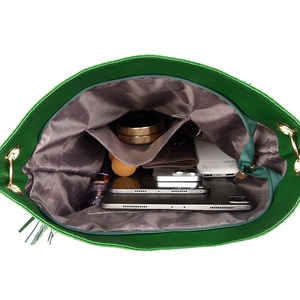 Top view of green tote bag interior showing spacious storage and organized pockets