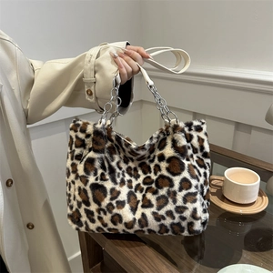 Fuzzy leopard print tote bag with silver chain handle for a stylish 2024 autumn winter look