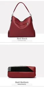 Detail view of burgundy tote bag showing lychee texture back pocket and contrast base
