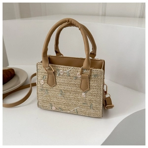 Sac à main en paille tressée avec broderie florale et lanières en cuir marron