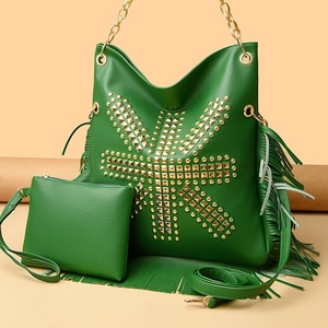 Green punk fringe tote with gold studs, chain handle, and matching small pouch