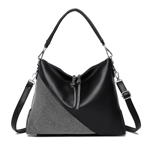 Black leather handbag for women featuring a diagonal rhinestone panel and lychee texture