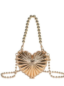 Golden heart-shaped crossbody bag with radial texture and beaded chain strap