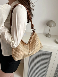 Retro woven straw tote bag with brown leather shoulder strap and knot detail for women