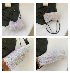Macro detail of iridescent sequins and smooth black shoulder strap on Y2K shoulder bag