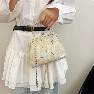 Straw woven crossbody bag with floral embroidery and gold metal handles for women