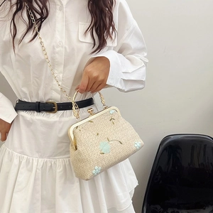 Woven straw crossbody bag with blue floral embroidery and gold chain strap for women