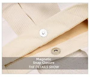 Close-up of magnetic buckle closure on a beige corduroy tote bag with metal hardware