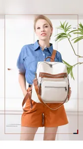 Detail of cream tassel backpack featuring brown leather trim and multi-pocket structure