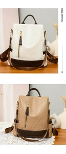 Detail of vintage PU leather backpack featuring woven texture and contrast color stitching