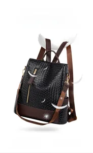 Detail of lightweight black woven PU leather backpack with brown straps and 0.43kg weight