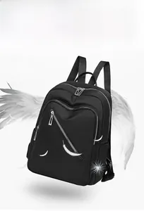 Detail showing the ultra-lightweight 0.34kg black nylon backpack with durable silver zippers