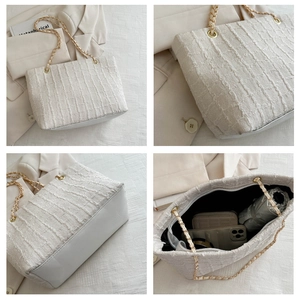 Detailed views of the large tweed tote bag showing its chain strap, base, and interior space