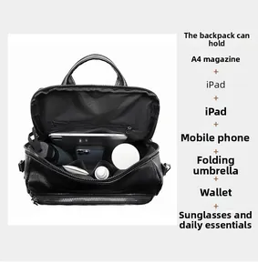 Detailed view of spacious black pebbled leather backpack showing interior capacity for daily essentials