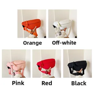 Selection of compact nylon waist bags in orange, cream, pink, red, and black colors