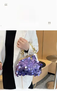 Detail of purple sequin crossbody bag featuring a vintage metal clasp and golden chain strap