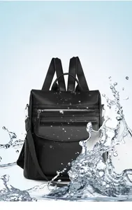 Waterproof and anti-freeze black lychee pattern leather backpack with multi-zipper detail