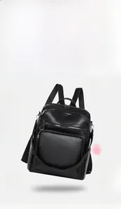Detail of lightweight black pebbled leather backpack weighing only 0.63kg with zipper pocket