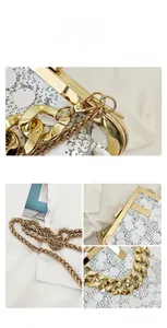 Close-up of white sequin evening bag with gold metal frame and thick chain strap details