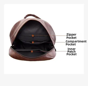 Interior view of brown backpack showing zipper pocket, compartment and inner slots