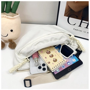 White crescent waist bag showing large capacity for phone, tablet and essentials