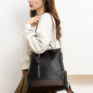 Women's vintage PU leather backpack with fish-scale texture and anti-theft design