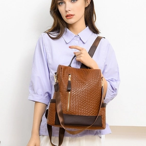 Brown woven PU leather anti-theft backpack for women with vintage versatile design