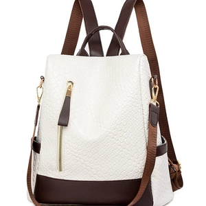 White quilted faux leather backpack with brown trim and gold zippers for women