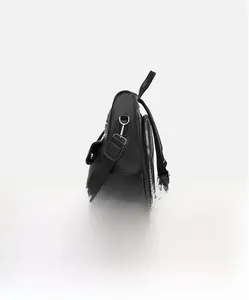 Side view of black lychee grain leather backpack with silver zippers and side pocket