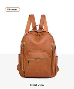 Front view detail of brown faux leather backpack with gold zippers and large pocket
