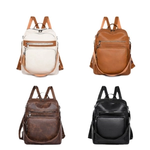 Minimalist canvas travel backpack for women in four stylish colors with tassel charm
