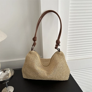 Minimalist straw woven tote bag for women in beige with brown shoulder strap for summer