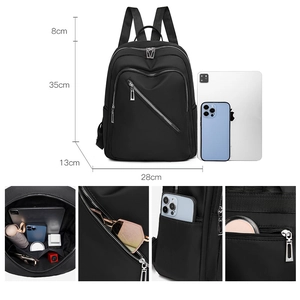 Minimalist black nylon backpack for women with silver zippers and large capacity storage
