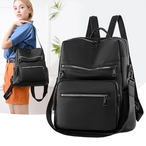 Black tassel backpack with lychee texture and multi-zipper pockets for daily travel