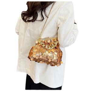 Glittery gold sequin evening bag with chain strap and metallic clasp closure
