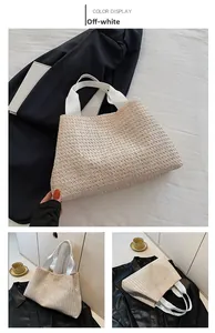 Détail du sac cabas en paille blanc crème avec texture tissée et larges anses souples