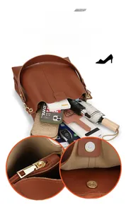 Detail der braunen Beuteltasche mit großem Fassungsvermögen, Magnetverschluss und Zipper