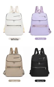 Four colors of casual oxford backpacks: white, purple, khaki, and black in a grid view