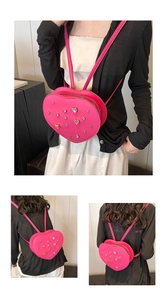 Detailed views of rose red heart-shaped backpack with colorful rhinestone embellishments
