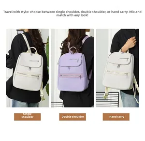 Detailed view of large capacity Oxford fabric backpack showing three carrying styles