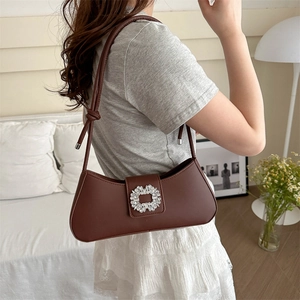 Chic brown underarm shoulder bag with luxury rhinestone buckle and knot strap detail