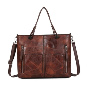 Grand sac cabas vintage marron avec texture à carreaux et poches zippées, vue à 45 degrés