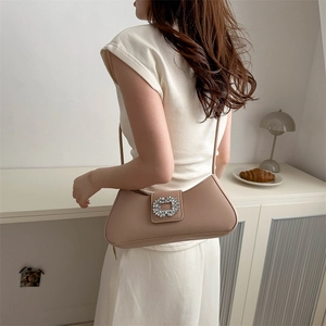 Elegant apricot underarm bag for women with sparkling crystal buckle and leather strap